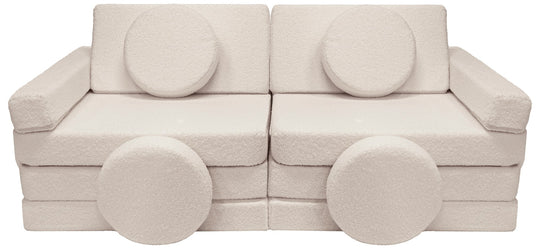 Modular bouclé sofa bed, multifunctional foam blocks, car with steering wheel