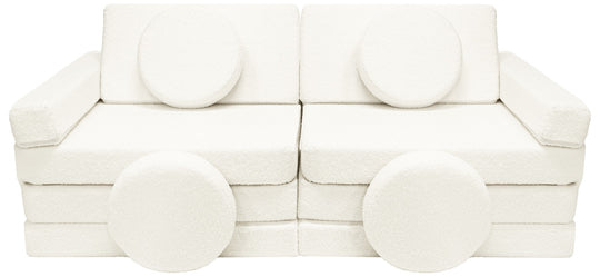 Modular bouclé sofa bed, multifunctional foam blocks, car with steering wheel